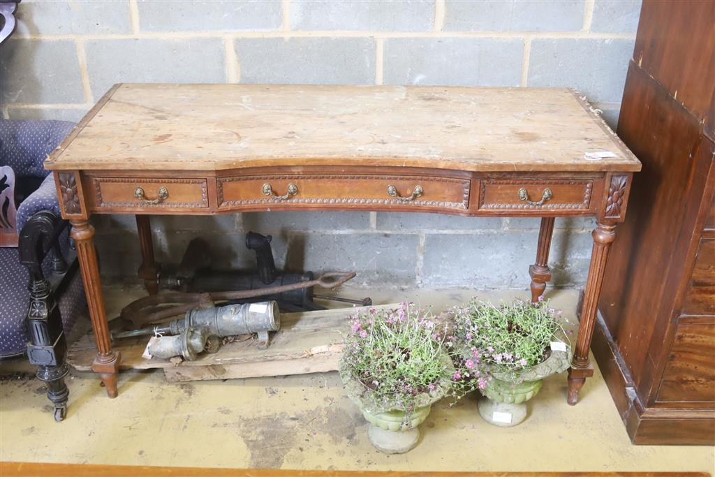 A French walnut dressing table, width 143cm, depth 59cm, height 79cm (a.f.)